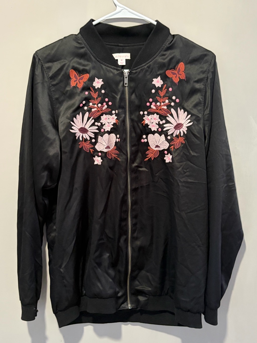 Xhiliration black hoodless zip jacket with floral embroidery on the front size M